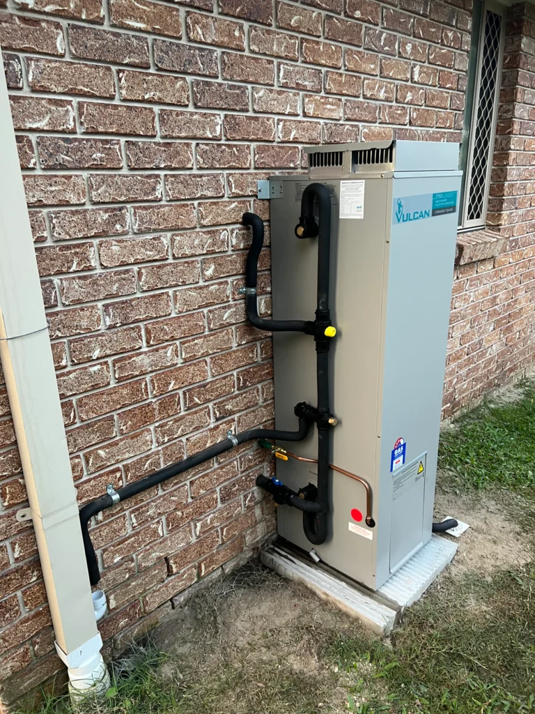 licensed plumber on site inspecting plumbing installation