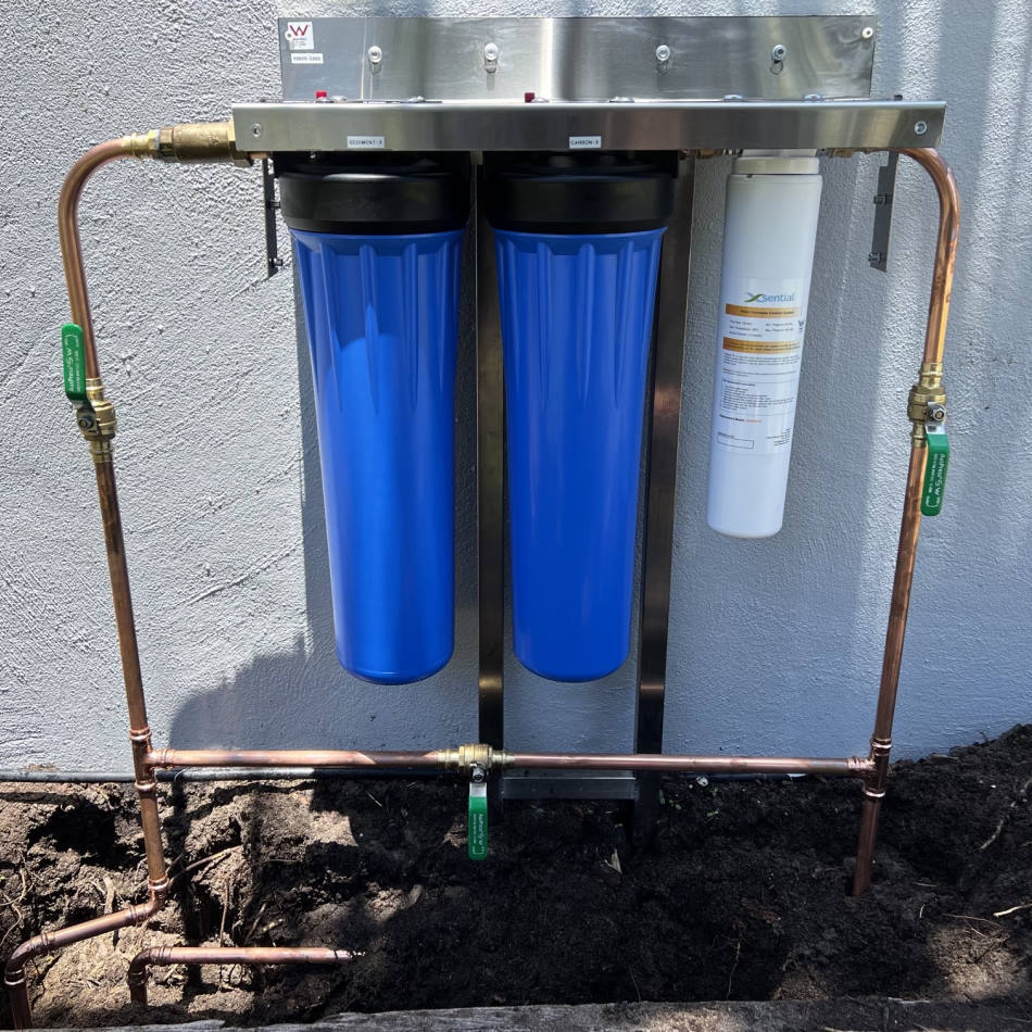 Whole-house water filter installed at the mains entry point of a residential property in Redcliffe