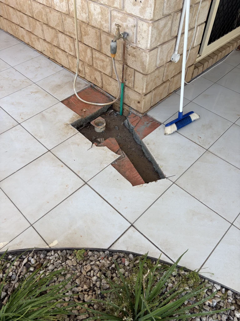 Water leak detection equipment in use, Redcliffe