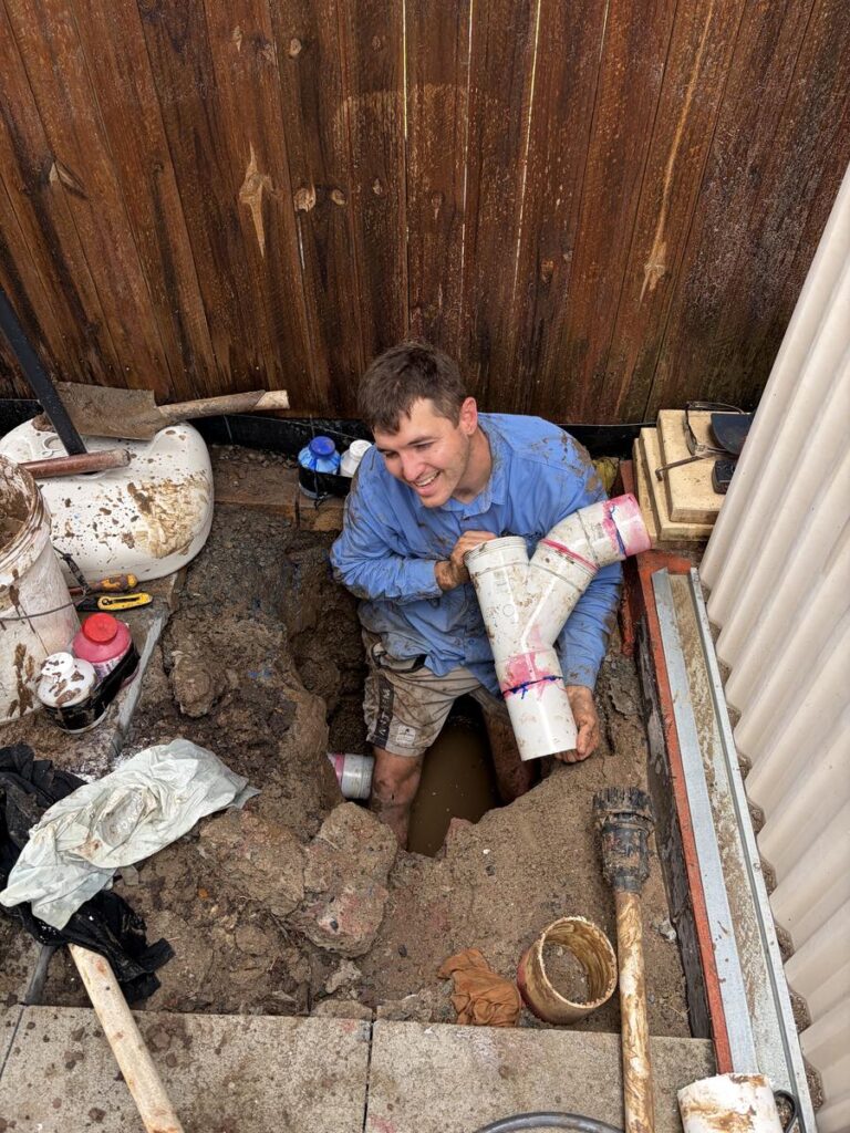 Coffison plumber handling replacement sewer junction fittings in Redcliffe